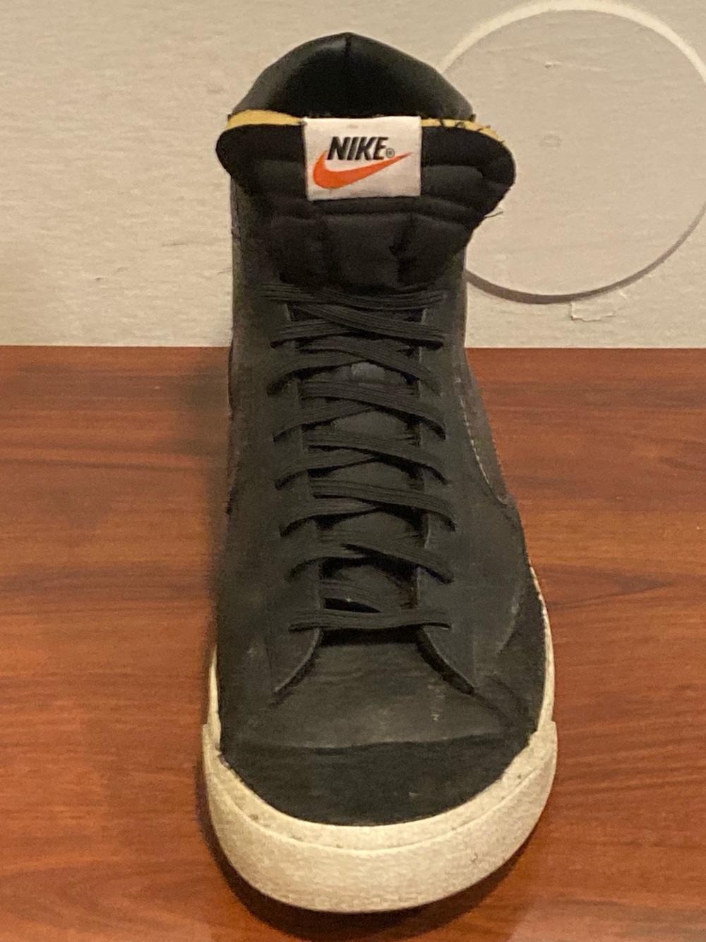 Nike Men’s Black High-Top Sneakers with Orange Logo